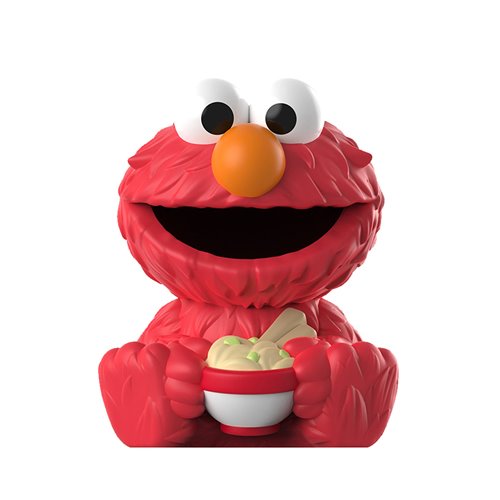 Red Sesame Street character holding a bowl of macaroni and cheese on a white background
