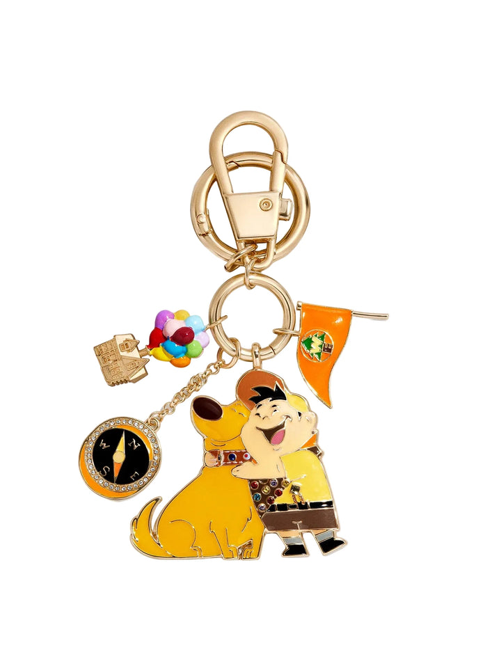 Keychain with cartoon character and colorful charms on a white background