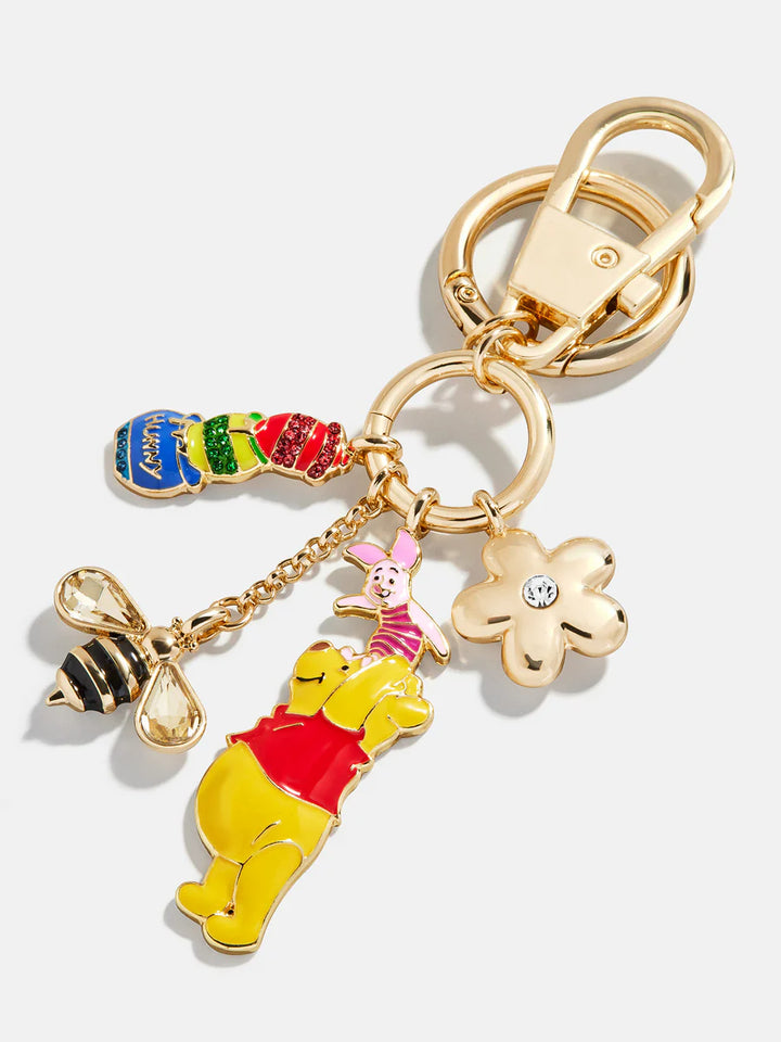 Keychain with Winnie the Pooh and friends charms on a white background