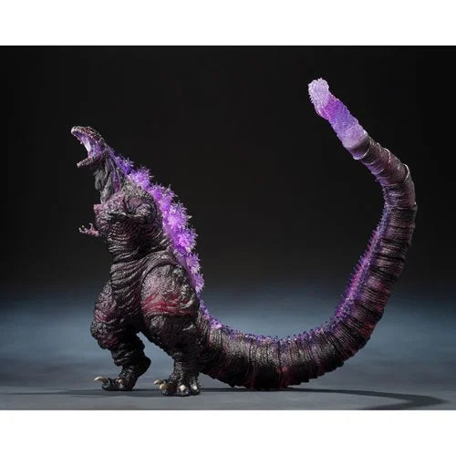 Monster toy with purple energy on a dark background