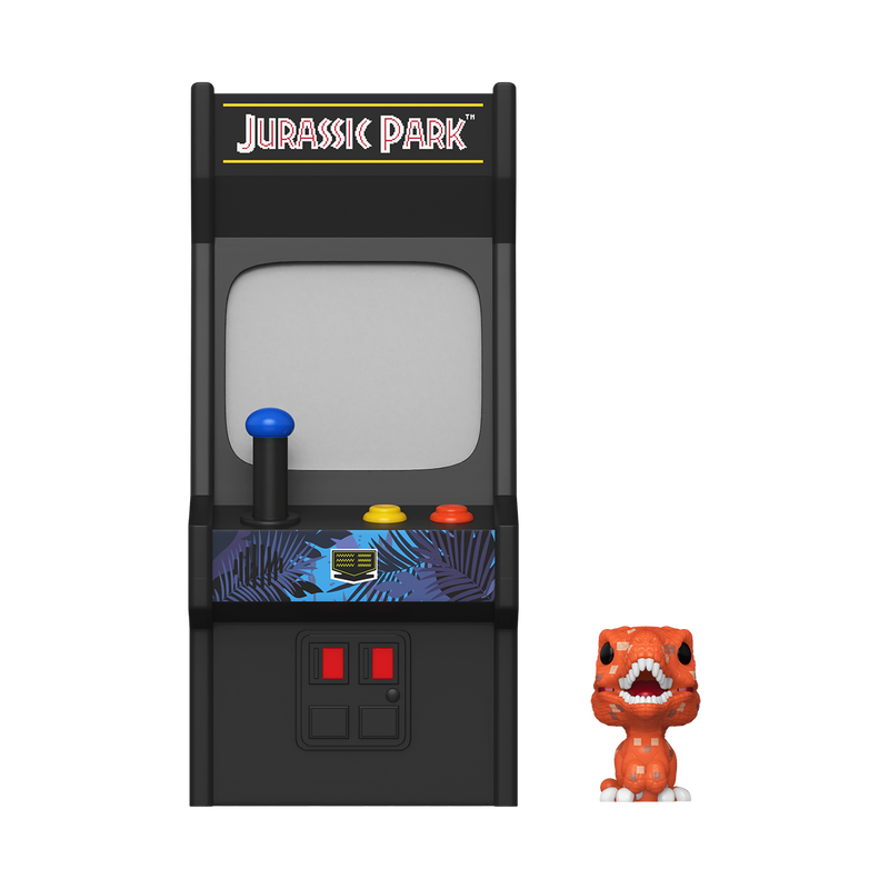 Miniature arcade machine with 'Jurassic Park' branding and a dinosaur figure in front.