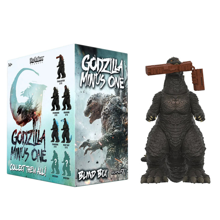 Godzilla figure with packaging on a white background