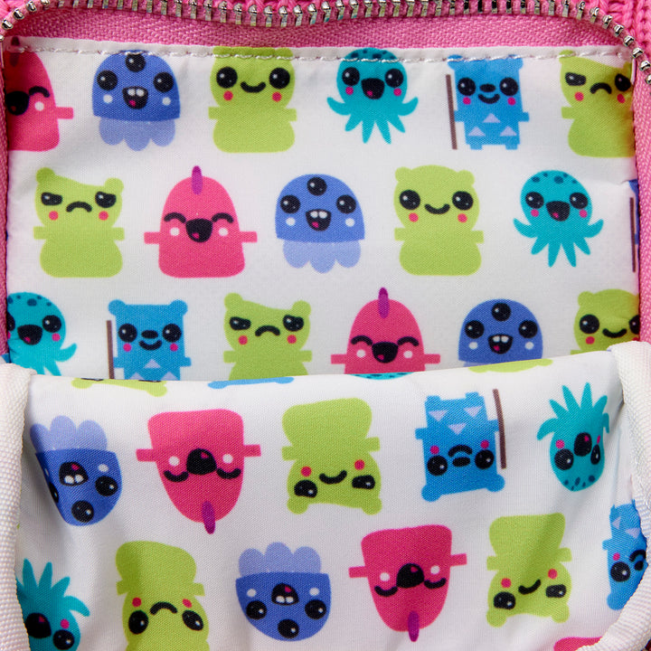 Close-up of a fabric with colorful cartoon octopus pattern on a white background.