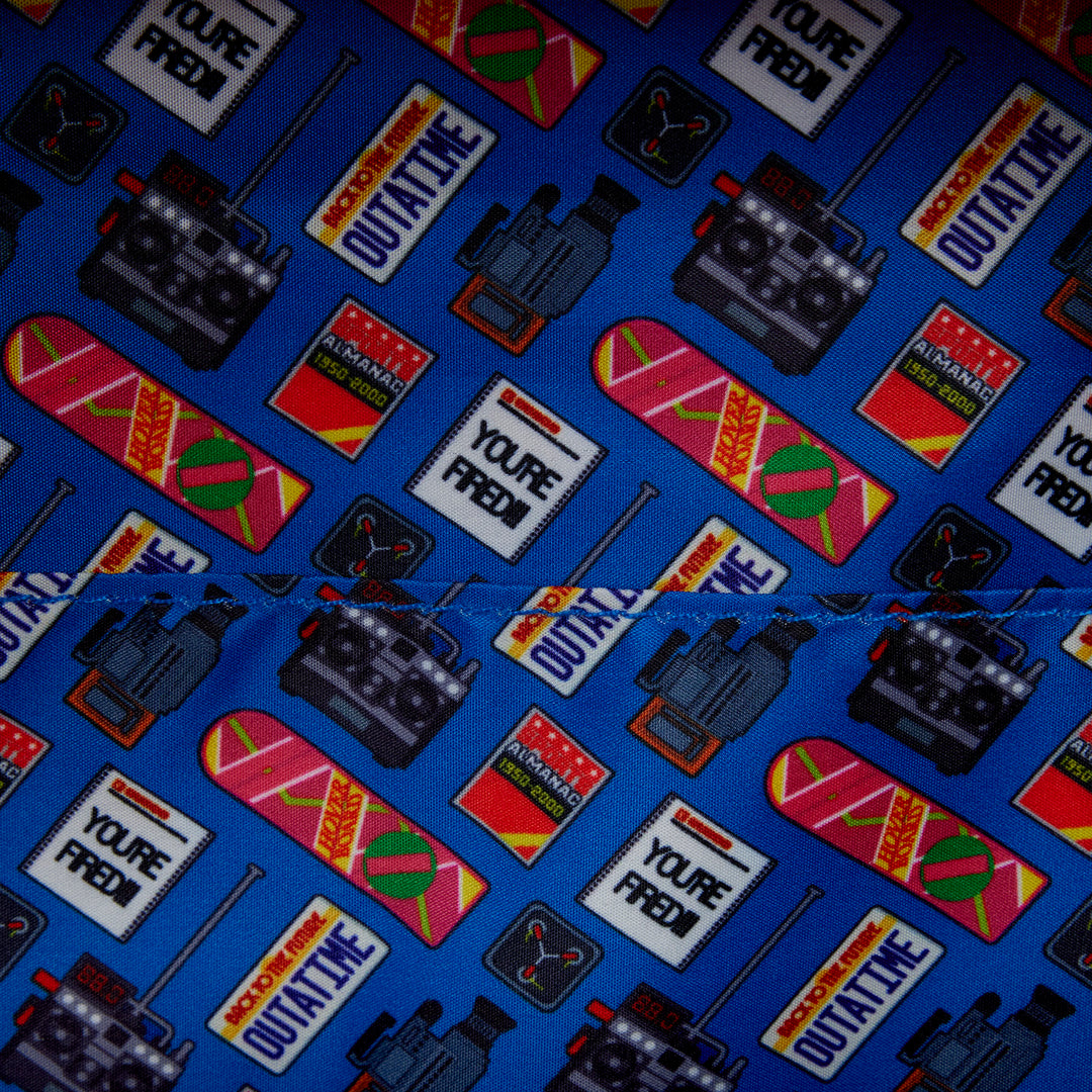 Patterned fabric with radio and text designs on a blue background