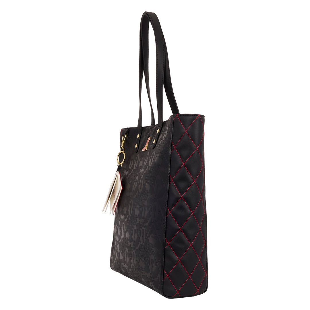 Black quilted handbag with red stitching on a white background