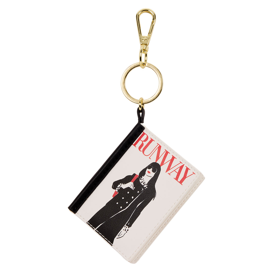 Keychain with a card featuring a fashion design and the word 'Runway'.
