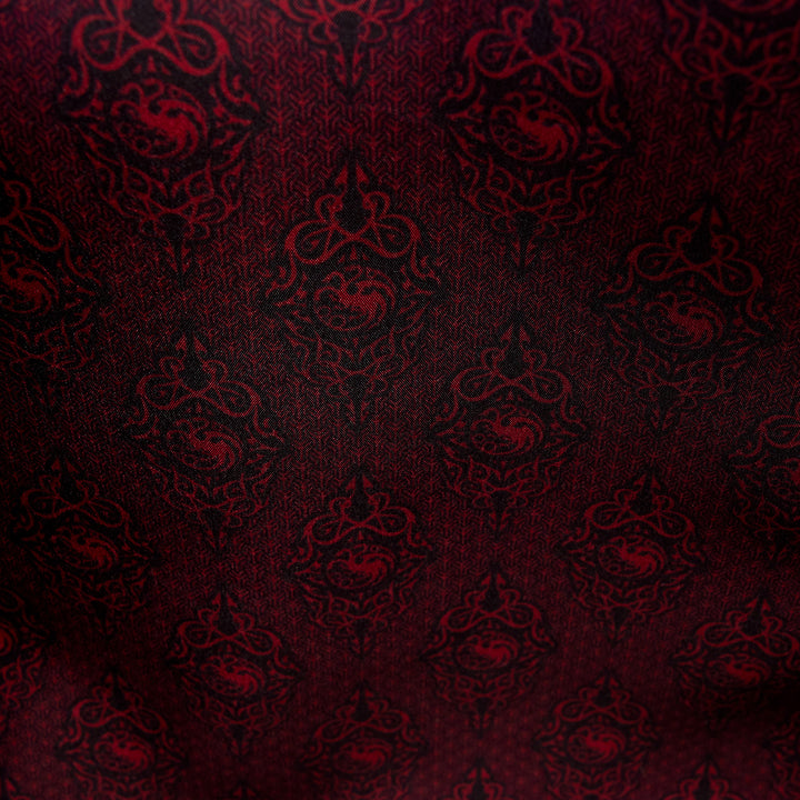 Dark red fabric texture with intricate patterns