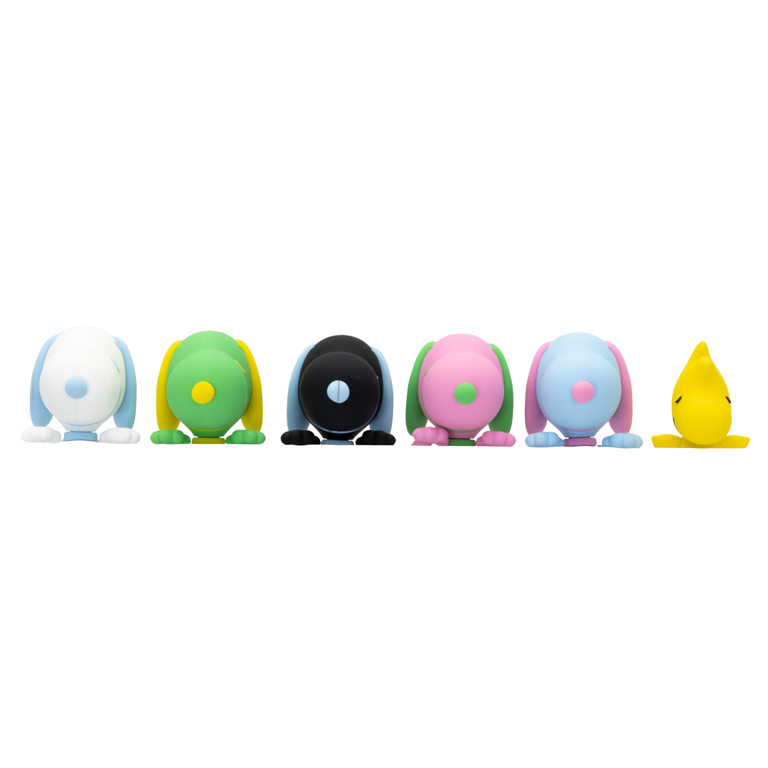 Colorful snoopy heads shaped figures arranged in a row on a white background