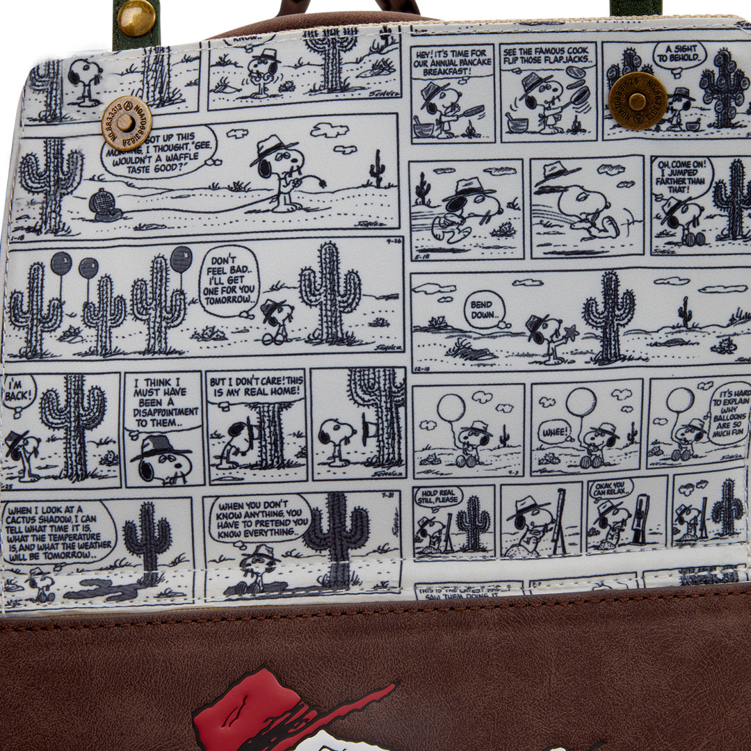 Handbag with comic-style design featuring characters and cacti, with a brown border.