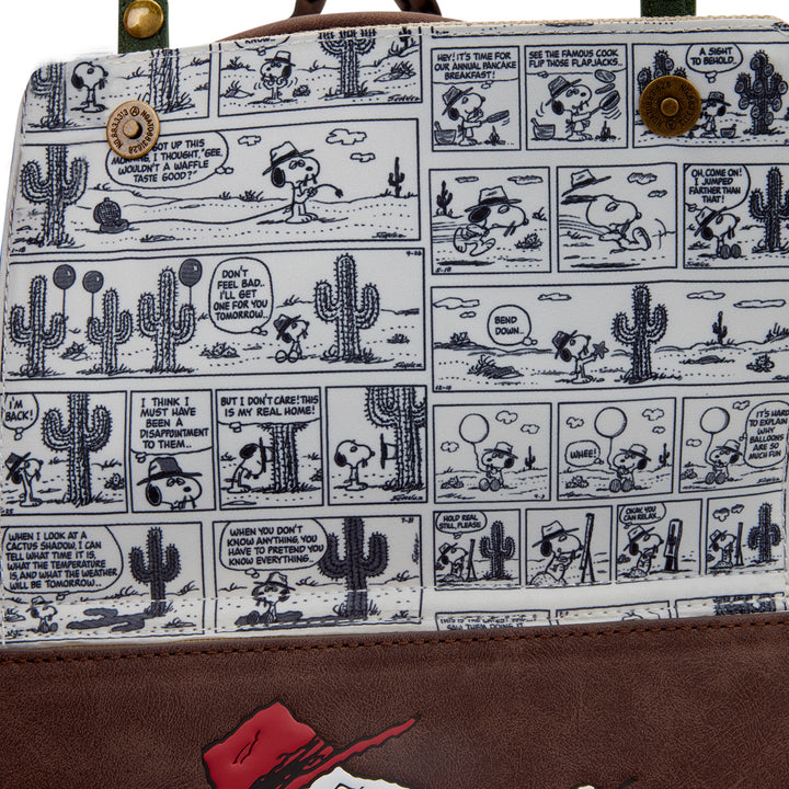 Handbag with comic-style design featuring characters and cacti, with a brown border.