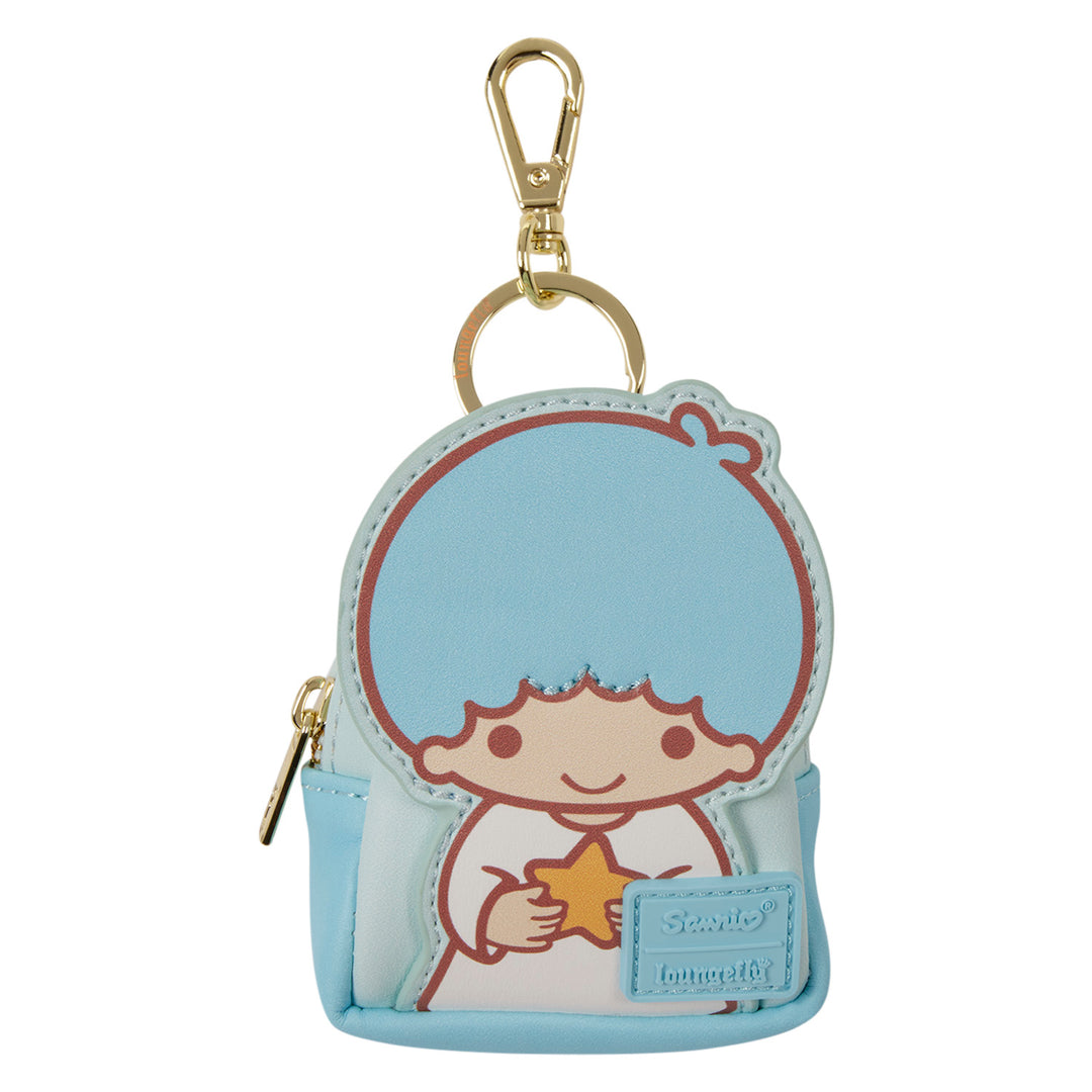 Keychain with cartoon character holding a star on a light blue background