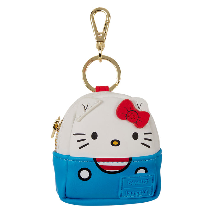Hello Kitty keychain with blue backpack on a white background