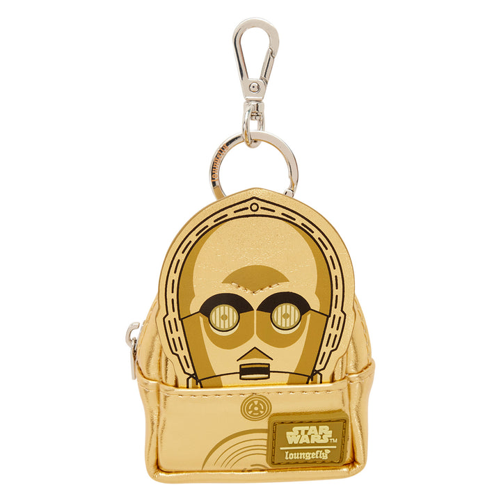 Gold C3PO keychain with a clear background