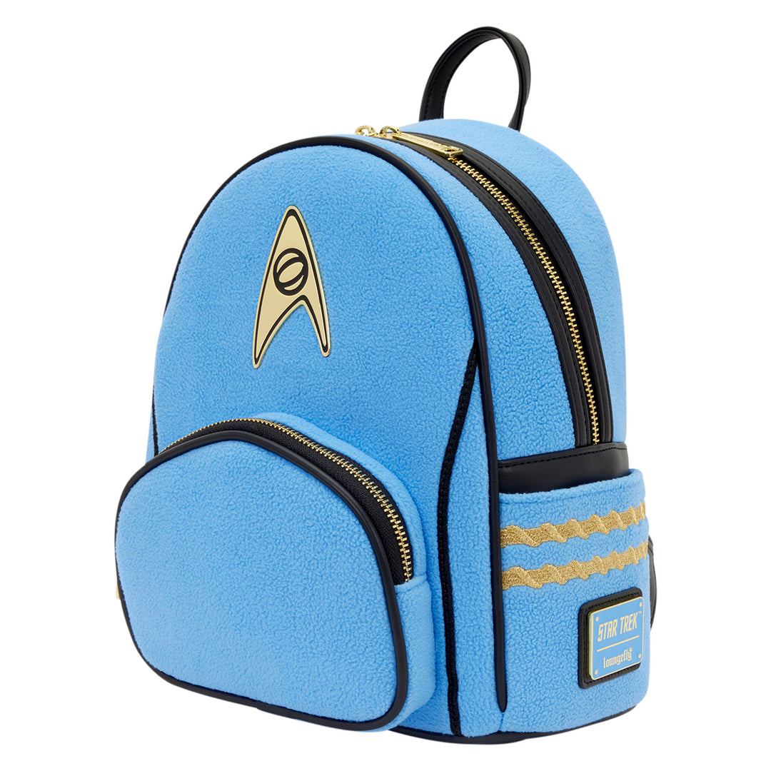 Light blue backpack with gold emblem on a white background