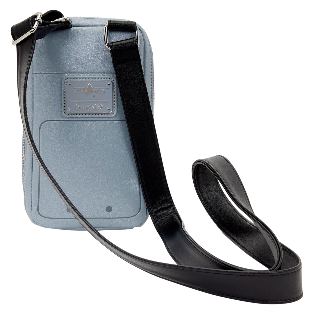 Small crossbody bag with a black strap on a white background