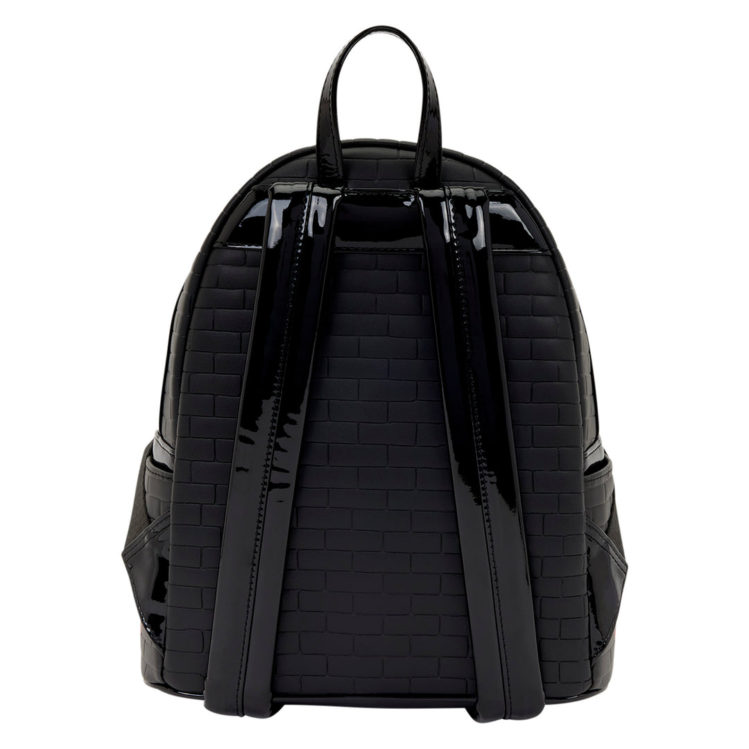 Black quilted backpack on a white background