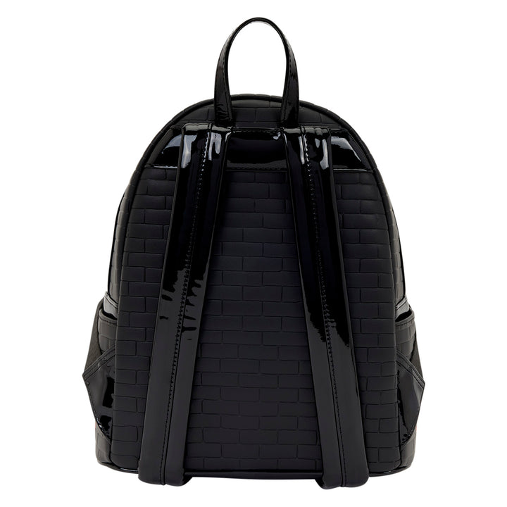 Black quilted backpack on a white background
