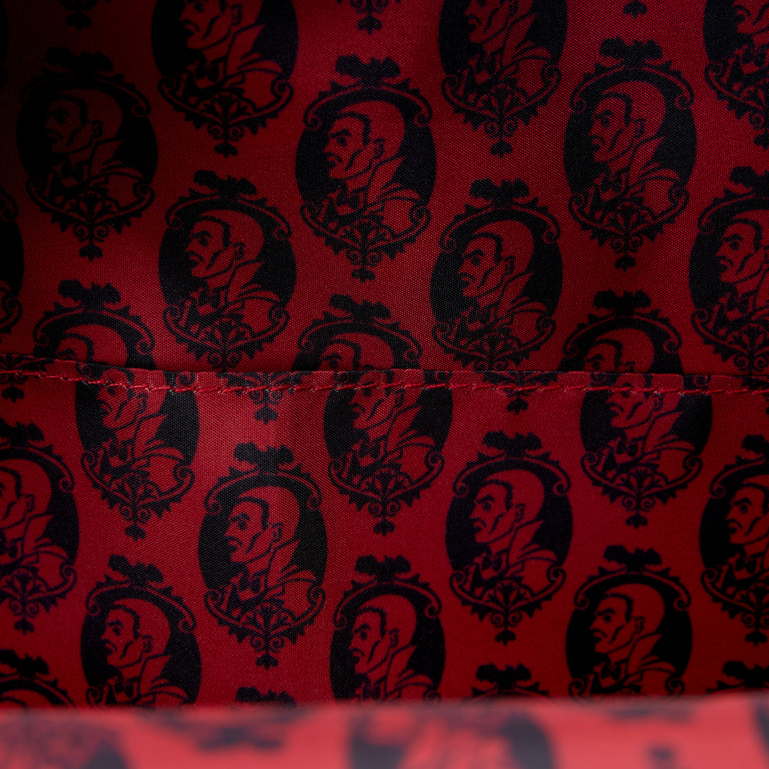 Red fabric with black vintage-style pattern of faces