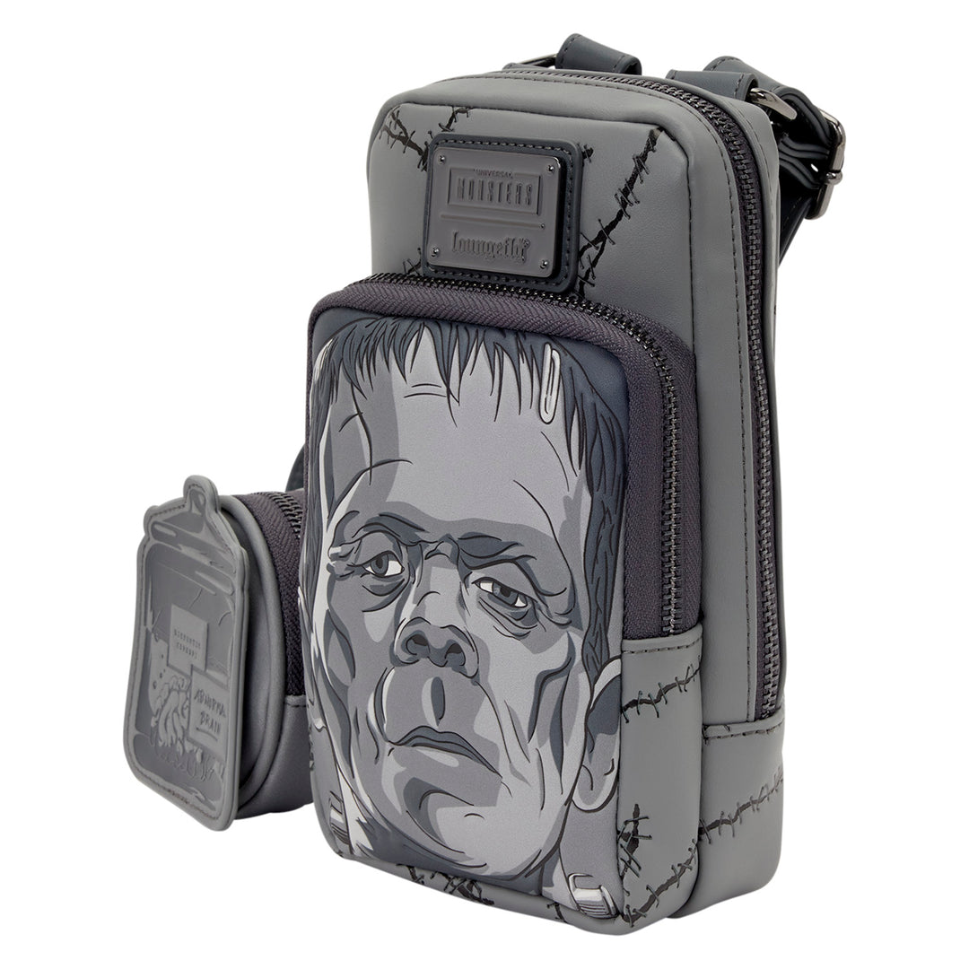 Gray pouch with a graphic design of a face on a white background