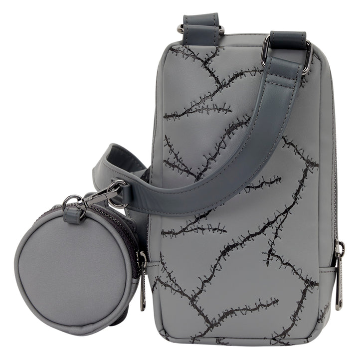 Gray crossbody bag with black branch pattern on a white background