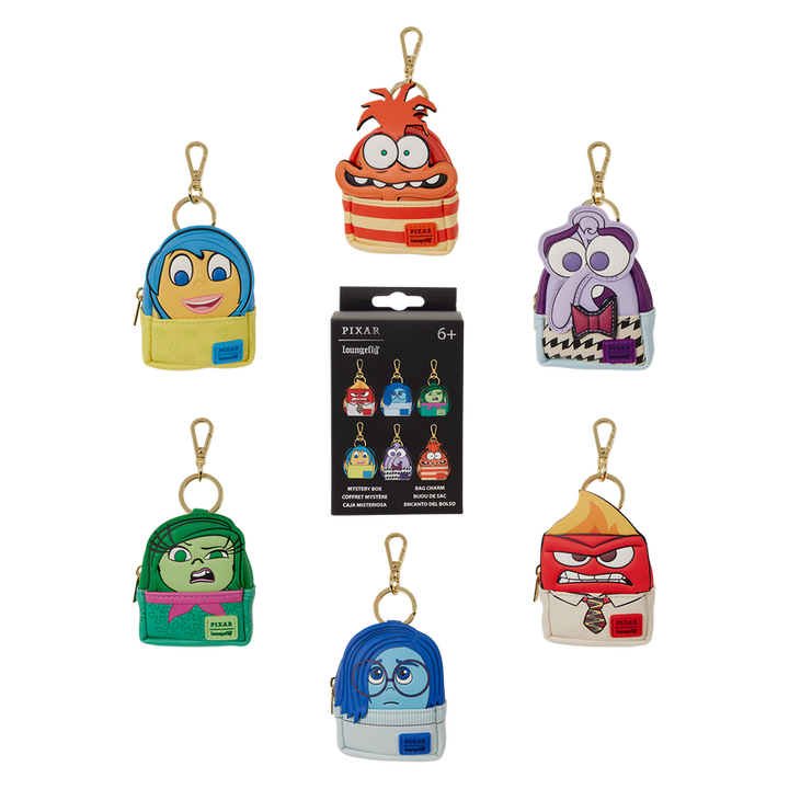 Set of colorful character keychains from Pixar on a white background