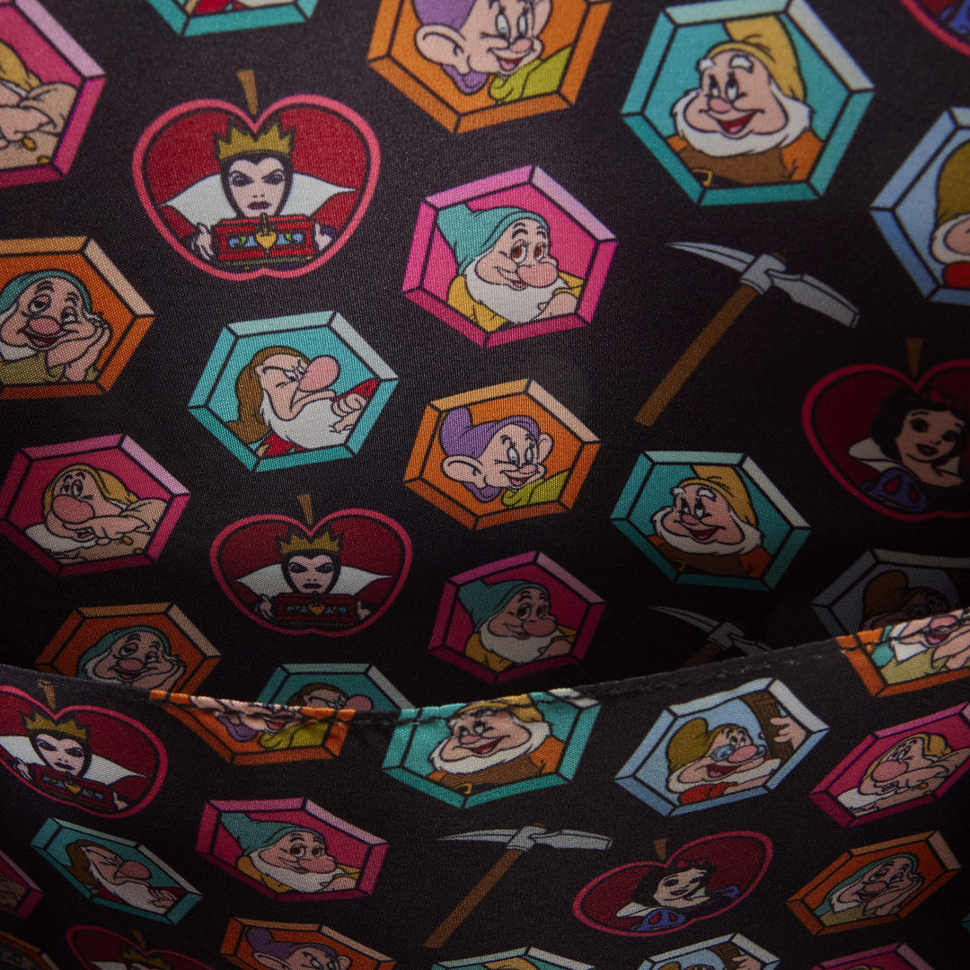 Patterned fabric with cartoon character patches on a black background