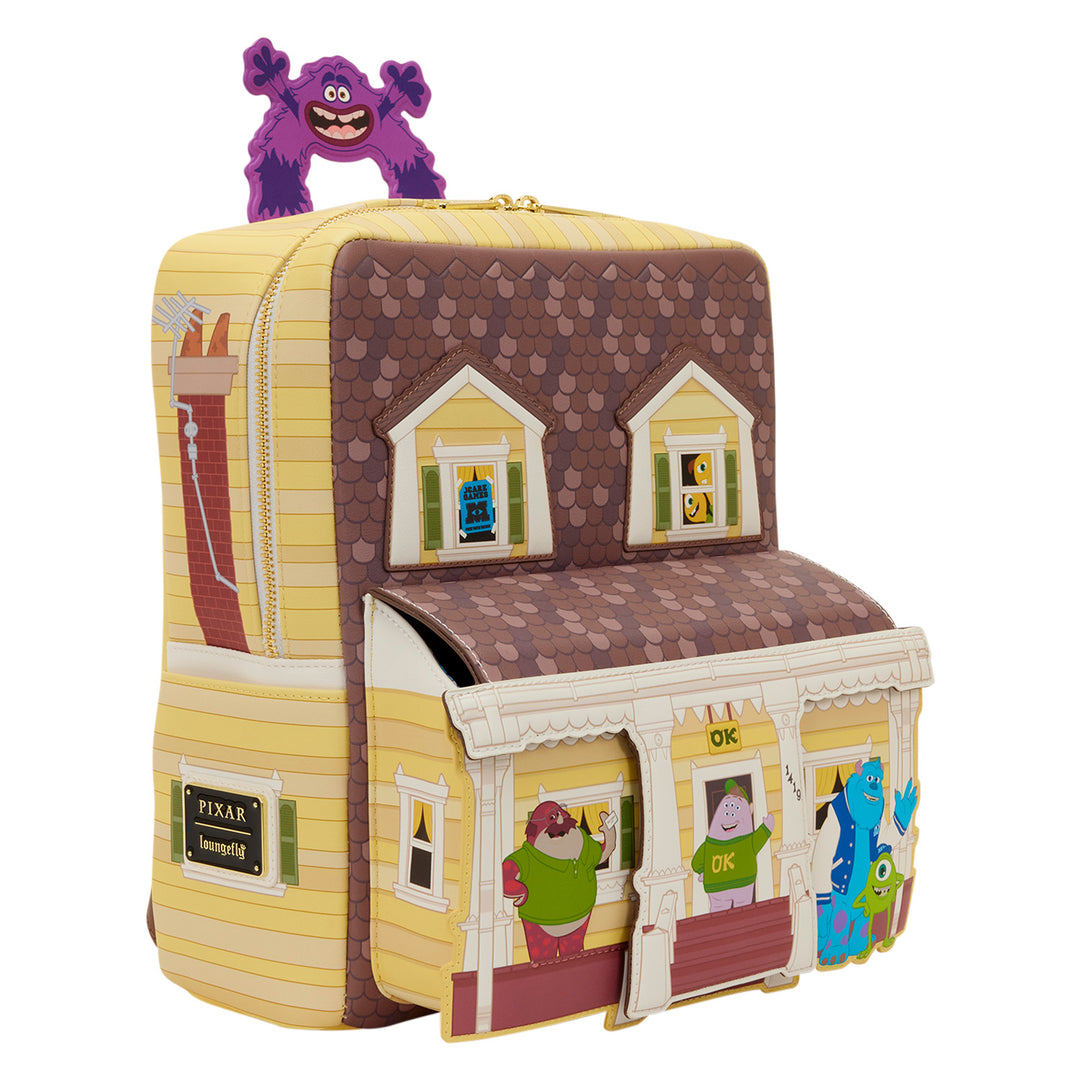 Toy house with character figures on a white background