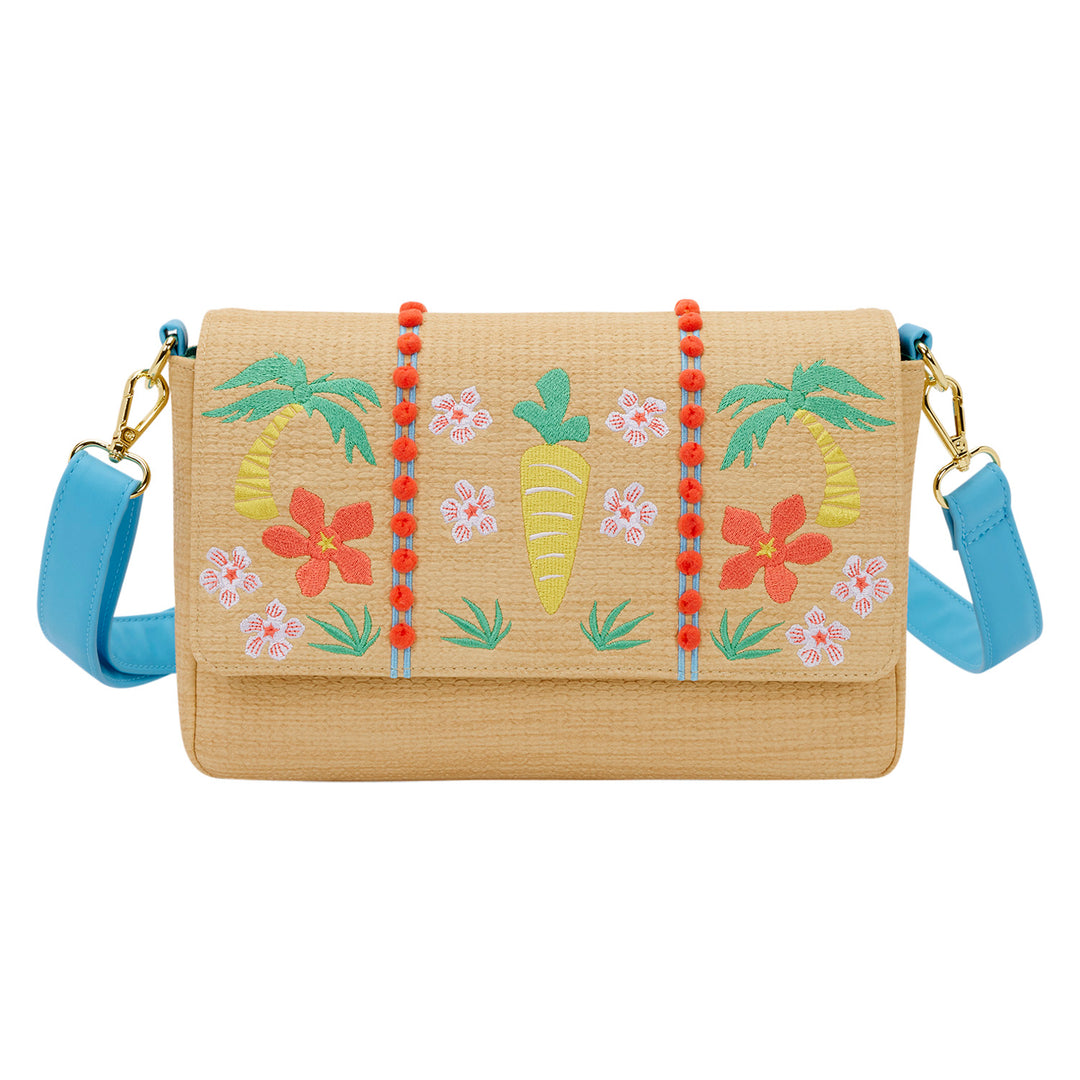 Woven handbag with floral and palm tree designs on a white background