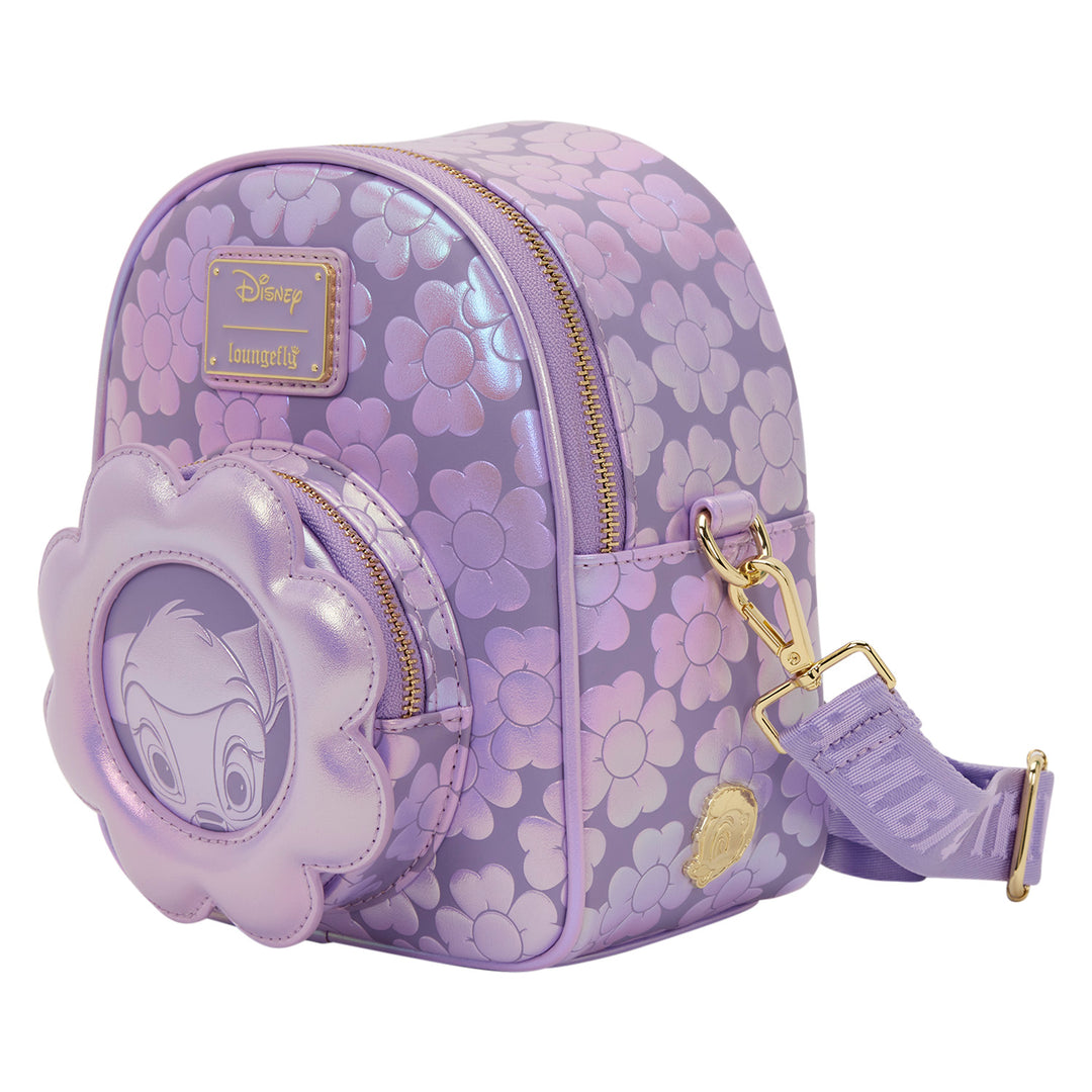 Purple floral-patterned backpack with character face on a white background