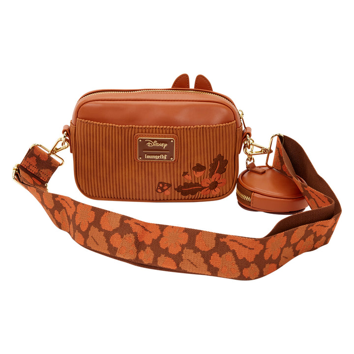 Brown textured crossbody bag with floral strap on a white background