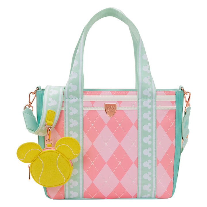 Pink and green handbag with a yellow character emblem on a white background