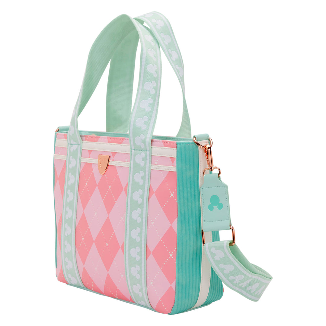 Pink and green patterned handbag with a matching strap on a white background