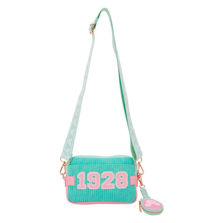Mint green crossbody bag with pink text and matching keychain on a white background