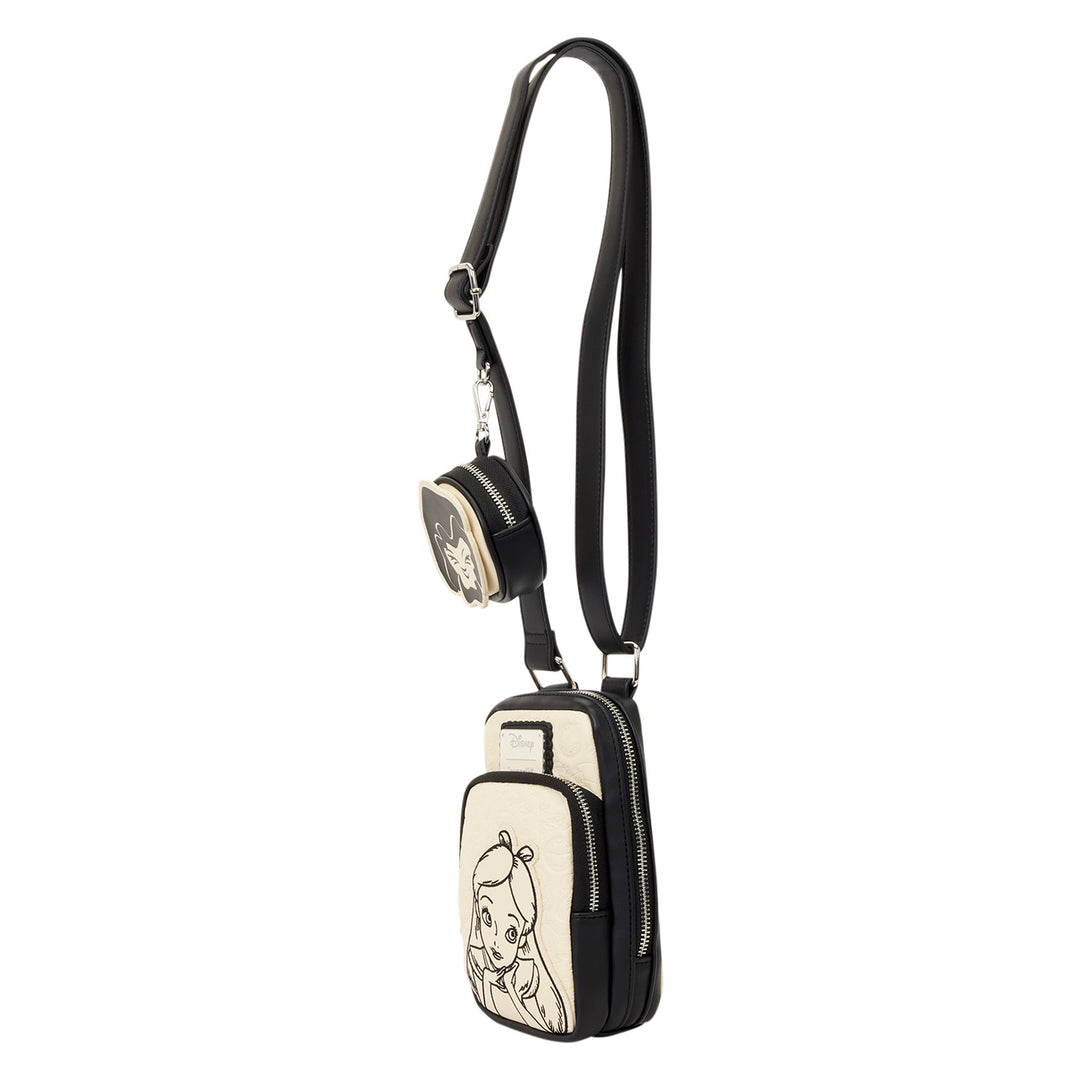 Small black and white crossbody bag with a character design on a white background