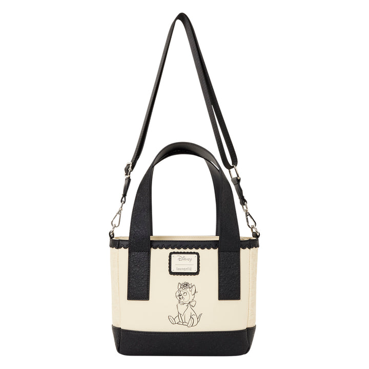 Black and white tote bag with a character design on a white background