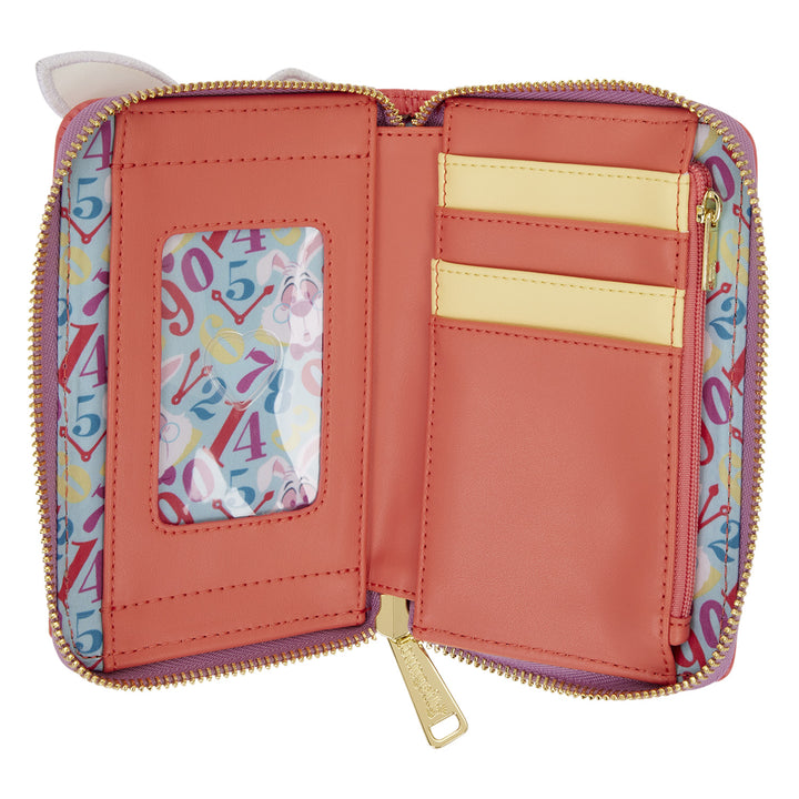 Open pink wallet with colorful interior pocket on a white background