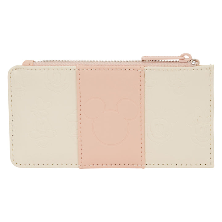 Two-tone beige and pink wallet on a white background