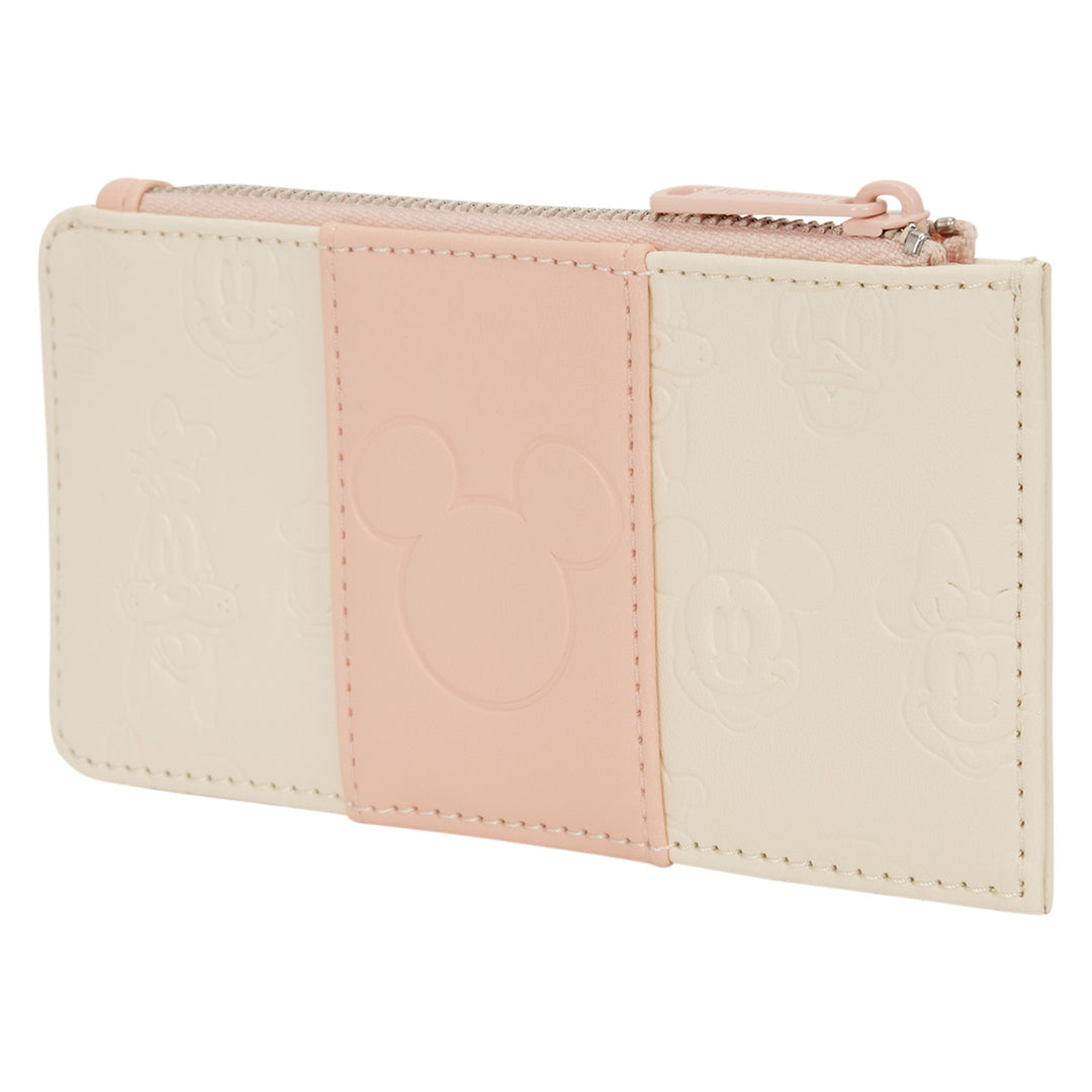 Two-tone wallet with pink and beige sections on a white background