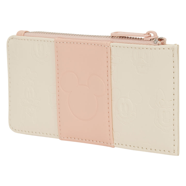 Two-tone wallet with pink and beige sections on a white background