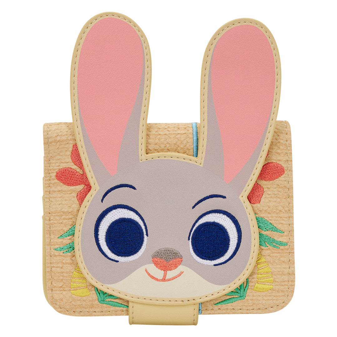 Woven bunny-shaped purse with cartoon face on a white background
