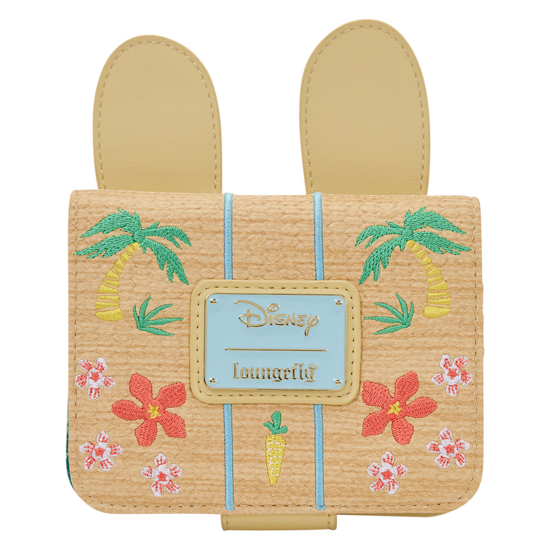 Woven bag with palm tree and flower designs on a white background