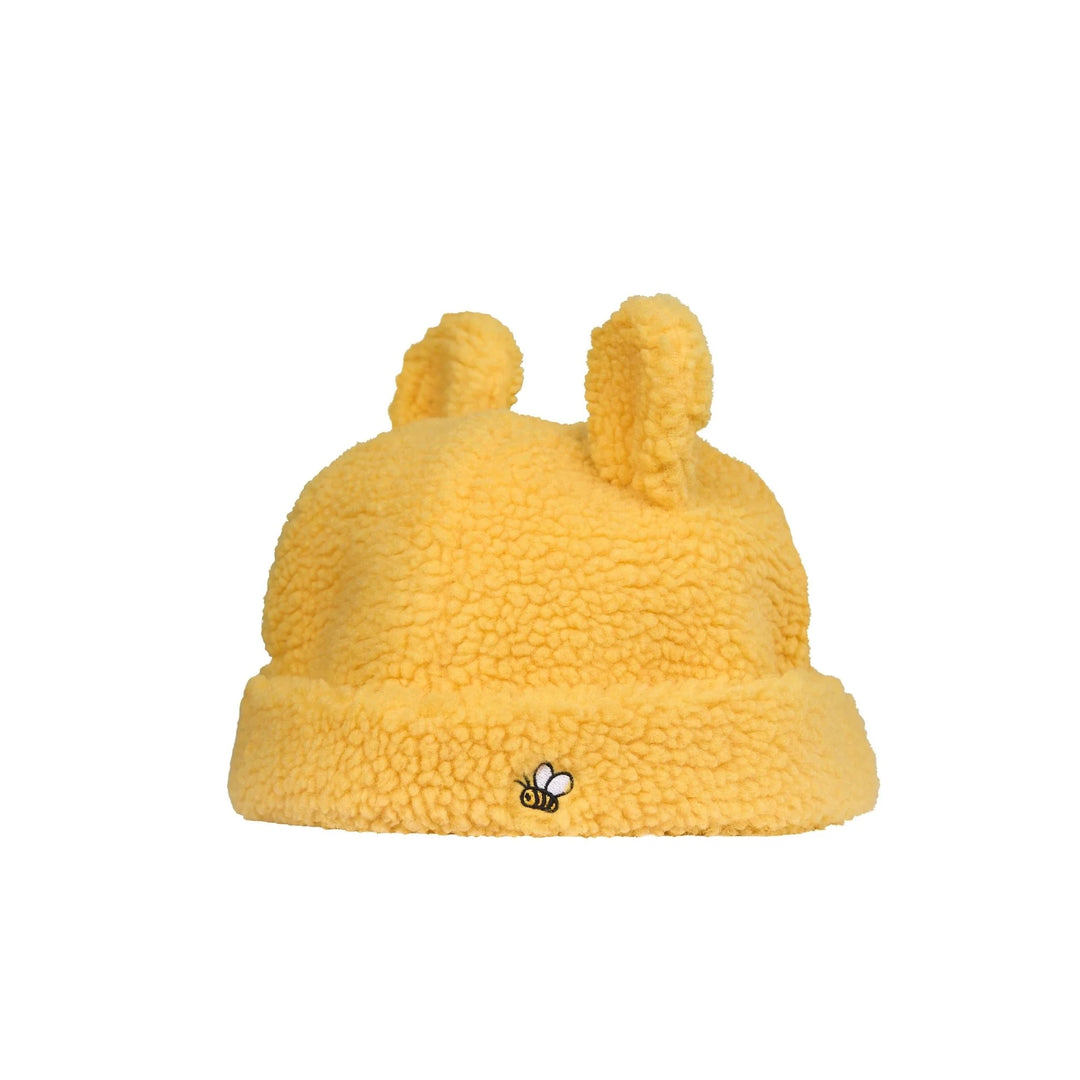 Yellow fleece hat with bear ears on a white background