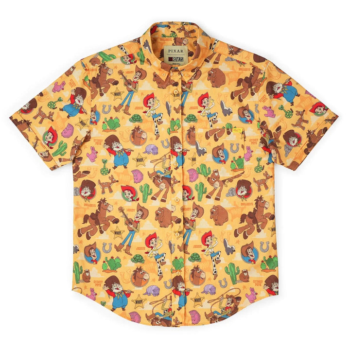 A short-sleeve button-up shirt by Piquadro featuring a colorful cartoon cowboy and western-themed print on a warm yellow-orange background, displayed flat against a white background.