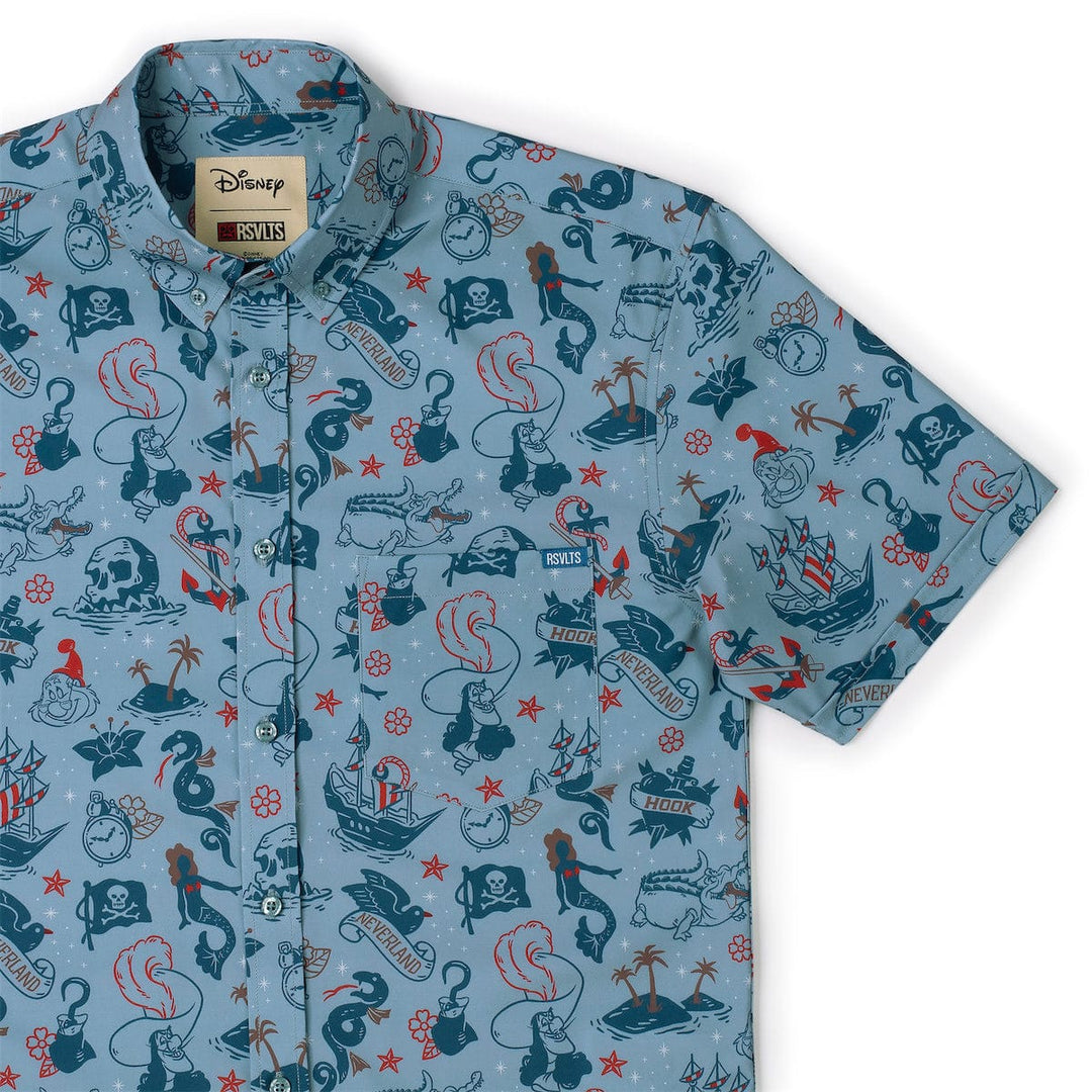 Short-sleeve shirt with pirate-themed design on a light blue background
