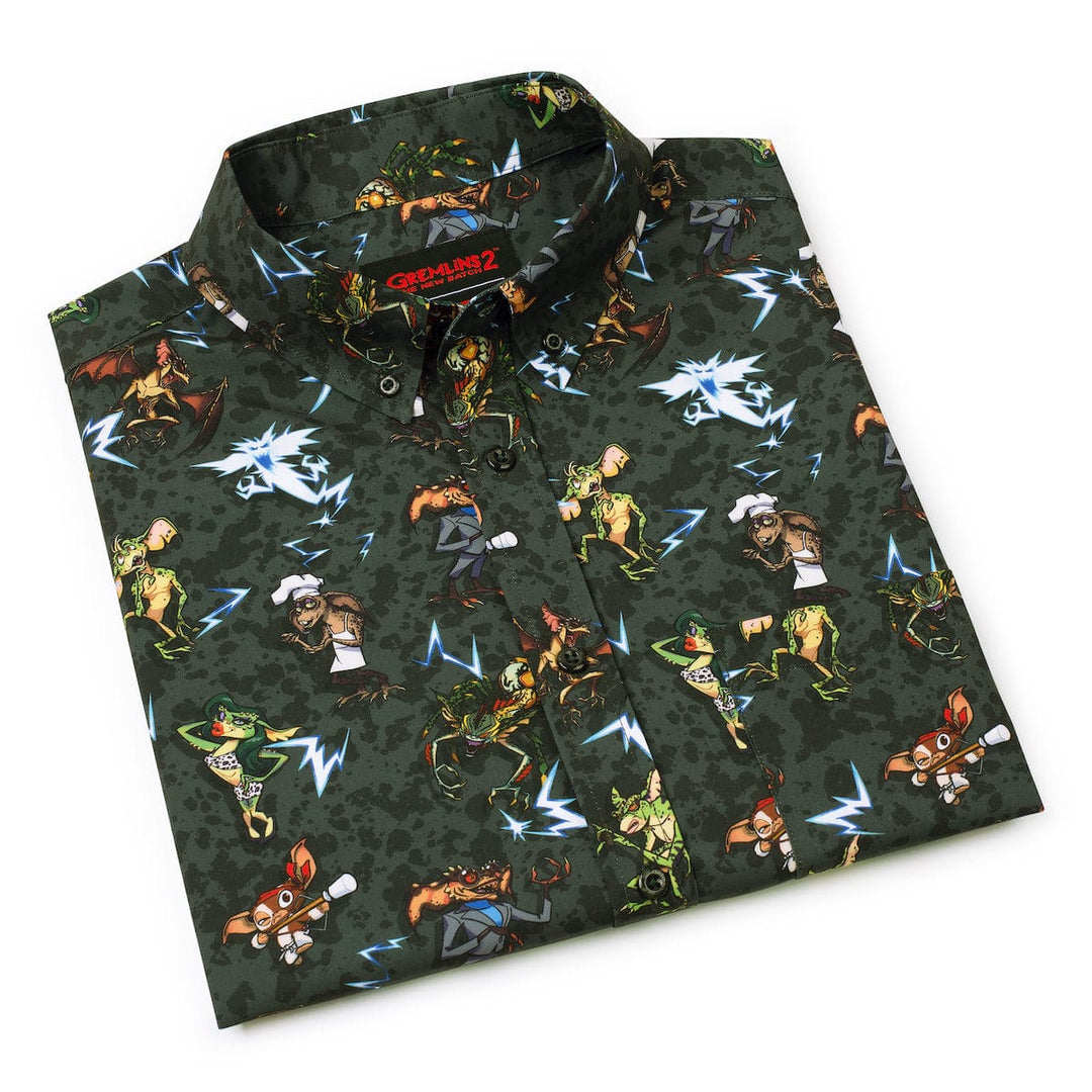 Folded shirt with colorful graphic design on a white background