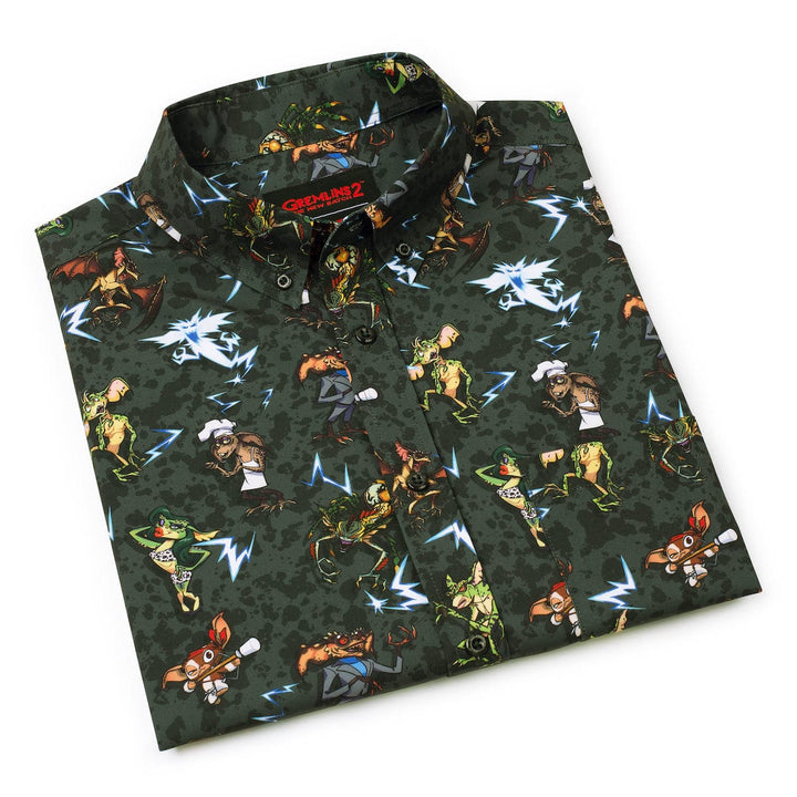 Folded shirt with colorful graphic design on a white background