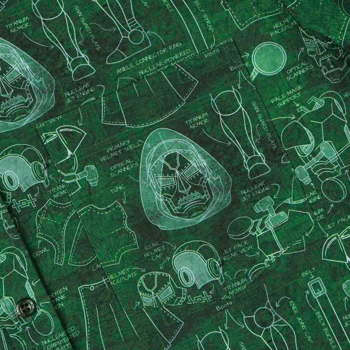 Green shirt with white technical drawings of a helmet and other parts on a green background
