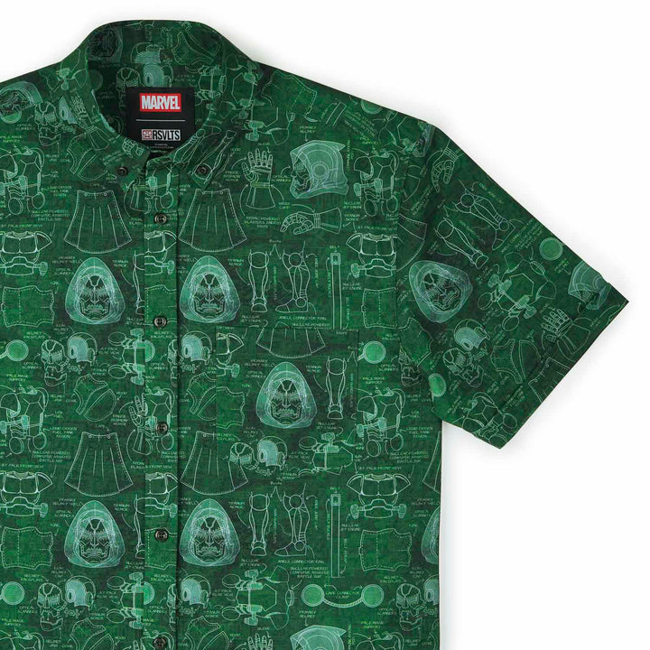 Green shirt with Marvel character schematics on a white background